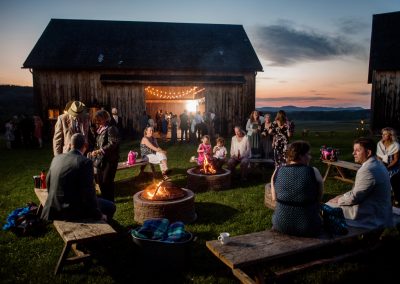 Guests enjoy campfires during a Nipmoose wedding in upstate New York, Heather Bohm-Tallman Photography